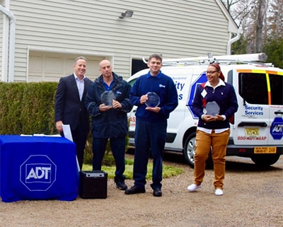 Alan Ferber, President of ADT Residential with ADT Lifesaver Award winners (from left): Service Technician Mike Glove, Installation Technician William Bondarenko and Dispatcher Krista Brandenburg. Alan Ferber, President of ADT Residential with ADT Lifesaver Award winners (from left): Service Technician Mike Glove, Installation Technician William Bondarenko and Dispatcher Krista Brandenburg.