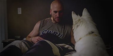 McKenzie Hartman and his dog Daisy.