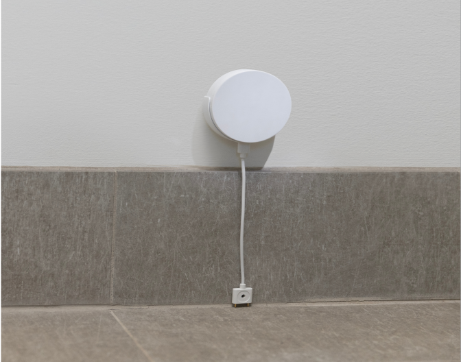 Water & Temperature Sensor installed above baseboard in a home Water & Temperature Sensor installed above baseboard in a home